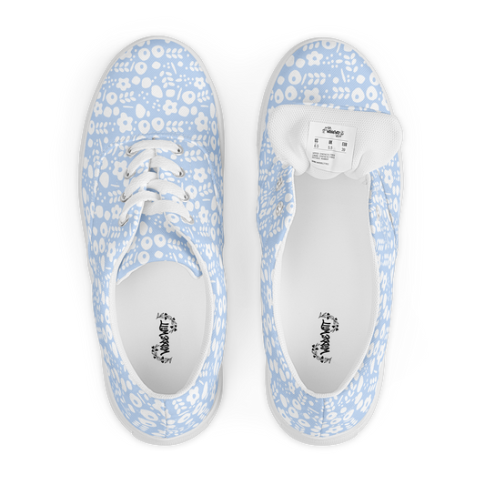 Von Oben Ansicht Hellblaue Damen Sneaker mit weißem Blumenmuster
