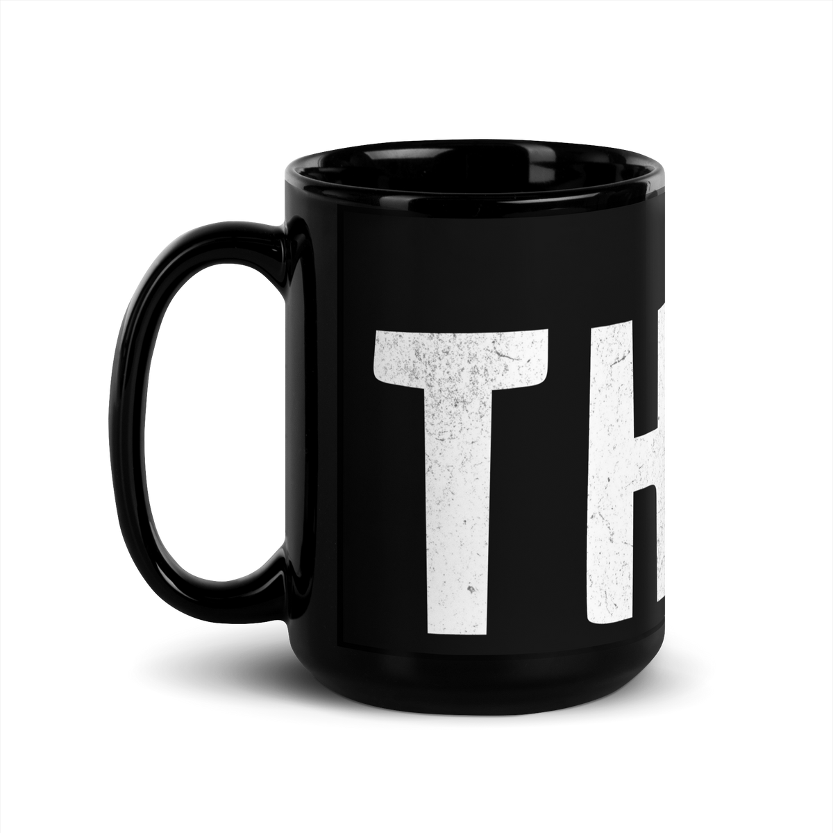 Schwarze Tasse mit THINK Aufdruck mit ausgeschnittenem N, Seitenansicht Links