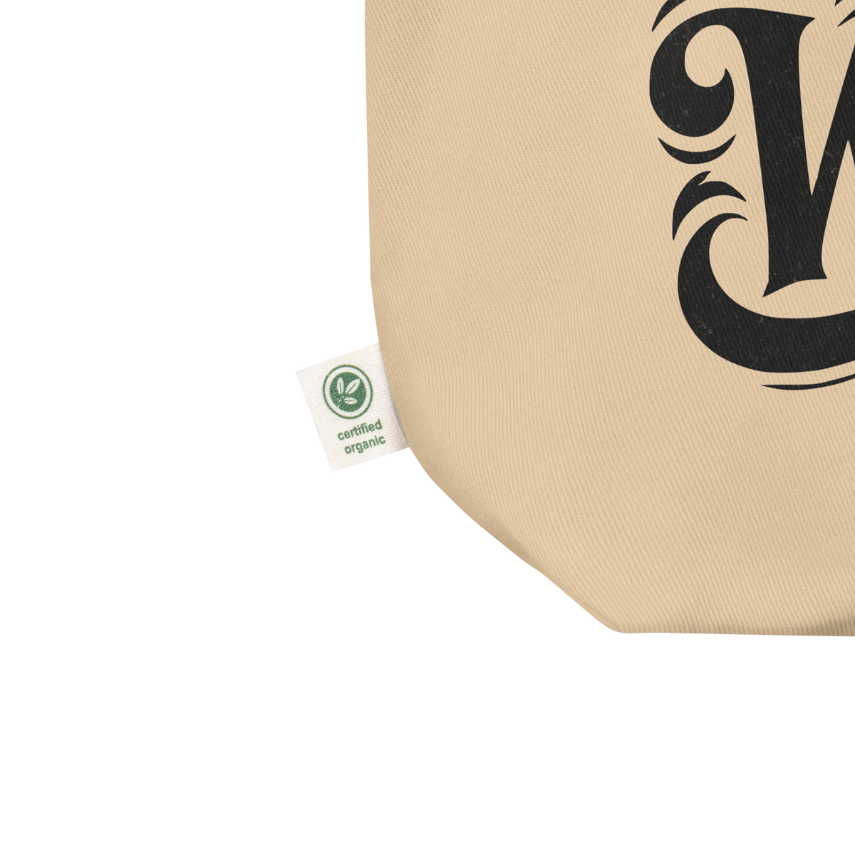 Nahaufnahme beiger Bio Stoffbeutel mit schwarzem verschnörkeltem Whoop Whoop Schriftzug mit zertifiziertem organischem Label